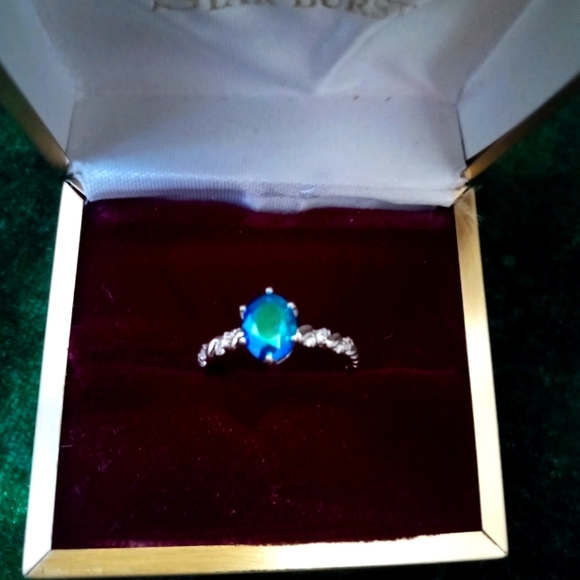 Jewelry - Blue/green aurora borealis oval faceted prong set size 7 ring